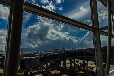 Cloudy sky seen through window