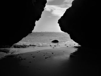 Scenic view of sea and cliff