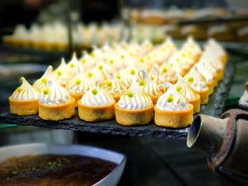 Sweet food arranged on granite plate