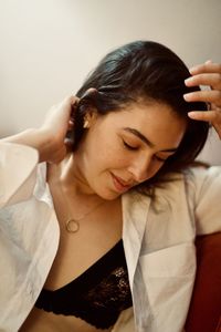 Close-up of young woman looking away