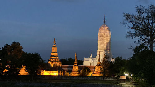 View of illuminated building against sky at dusk