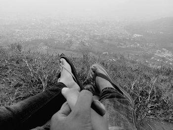 Low section of person relaxing in water