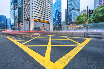 Text on road by city street