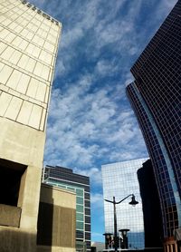 Low angle view of skyscrapers against sky