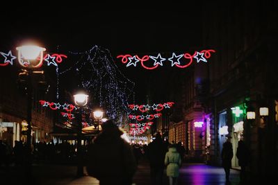 People in city at night