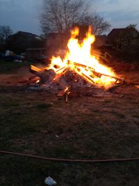 Fire in field at night