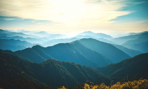 Scenic view of mountains against sky during sunset