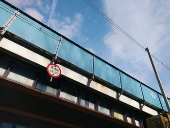 Low angle view of clock tower against sky