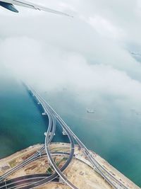 High angle view of road by bridge against sky