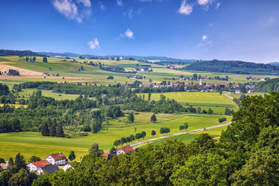 Scenic view of agricultural field against sky