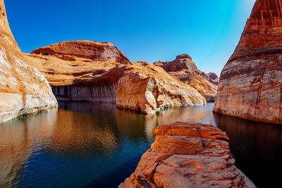 Scenic view of rock formations in water