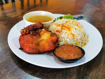 High angle view of food served on table