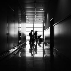 Silhouette of man in corridor