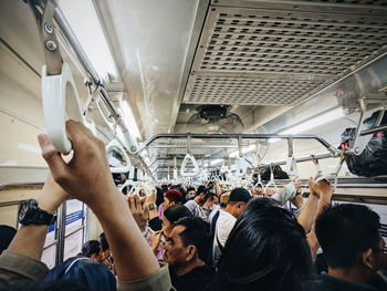 Passengers crowd in train