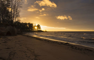 Scenic view of sea at sunset