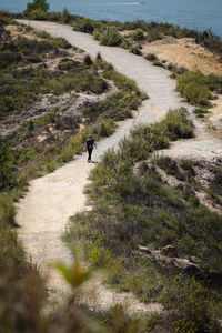 Man walking on footpath