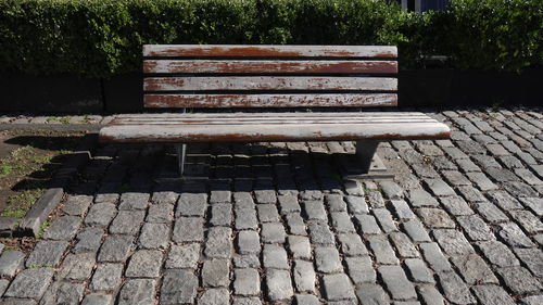 Empty bench in park