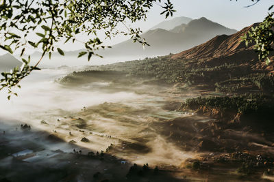 Scenic view of mountains against sky during sunset