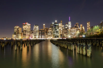 Manhattan night view from the brooklyn bridge park 