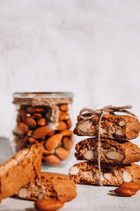 Traditional italian cantuccini cookies with almonds in glass jar. sweet dried biscuits. homemade 