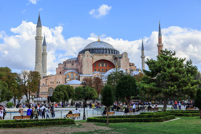  group of people outside mosque