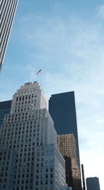 Low angle view of modern buildings against sky