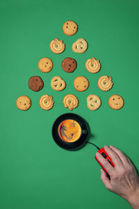 Abstract accept cookie and espresso coffee with cookies for christmas