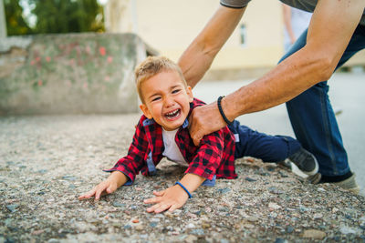 Happy mother and son on baby