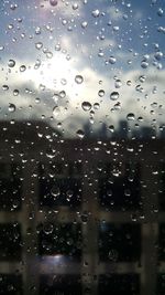 Full frame shot of wet window in rainy season
