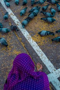 High angle view of woman on street during autumn