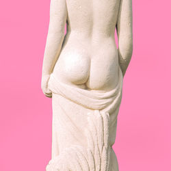 Close-up of a sculpture against pink background