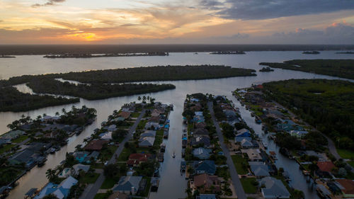 High angle view of sea against sky during sunset