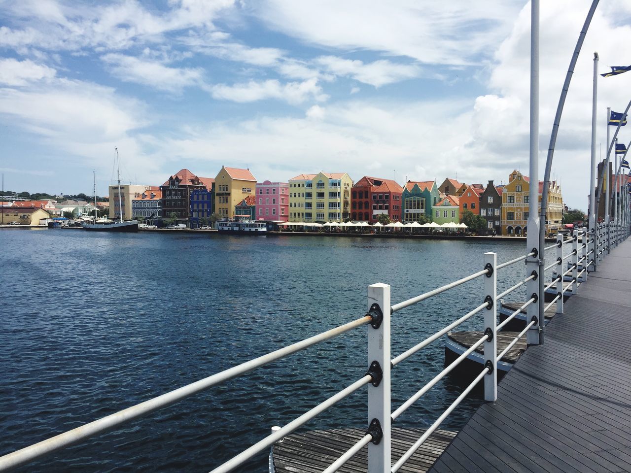 architecture, built structure, cloud - sky, sky, water, building exterior, city, railing, nautical vessel, transportation, nature, day, no people, building, mode of transportation, outdoors, river, travel, residential district