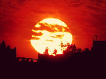 Scenic view of dramatic sky at sunset