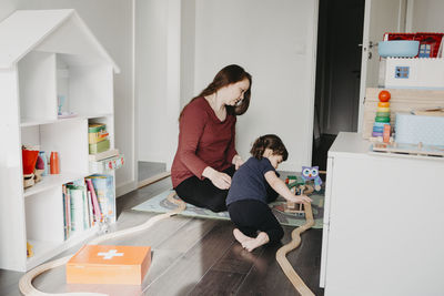 Mother playing with daughter