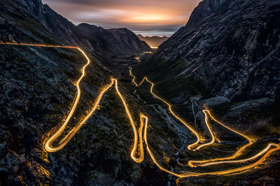 Scenic view of mountains against sky during sunset