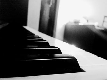 Close-up of piano in the dark