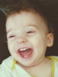 Close-up portrait of smiling boy