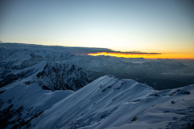 An rare moment of a sunrise from the top of a himalayan mountain
