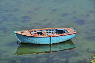 High angle view of boat moored on sea