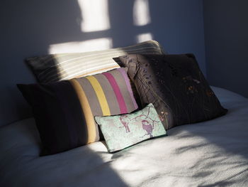 Close-up of blanket on bed at home