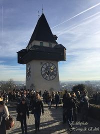 View of clock tower against sky in city