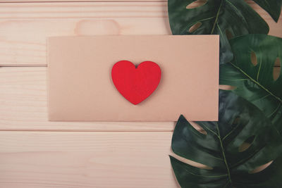 Directly above shot of heart shape made on paper