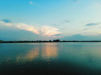 Scenic view of sea against sky at sunset