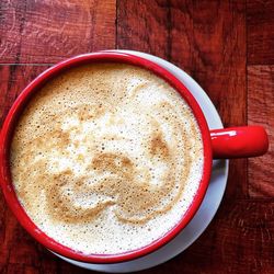 High angle view of coffee in cup on table