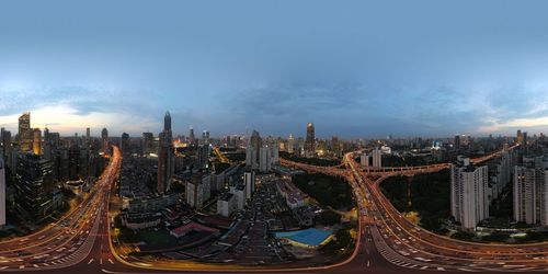 High angle view of modern buildings against sky in city