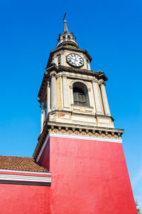 Low angle view of colonial san francisco church against clear blue sky
