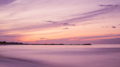 Scenic view of sea against dramatic sky