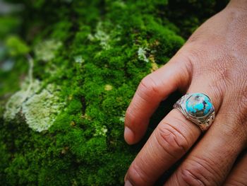 Close-up of person holding hand