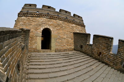 Low angle view of old building against sky